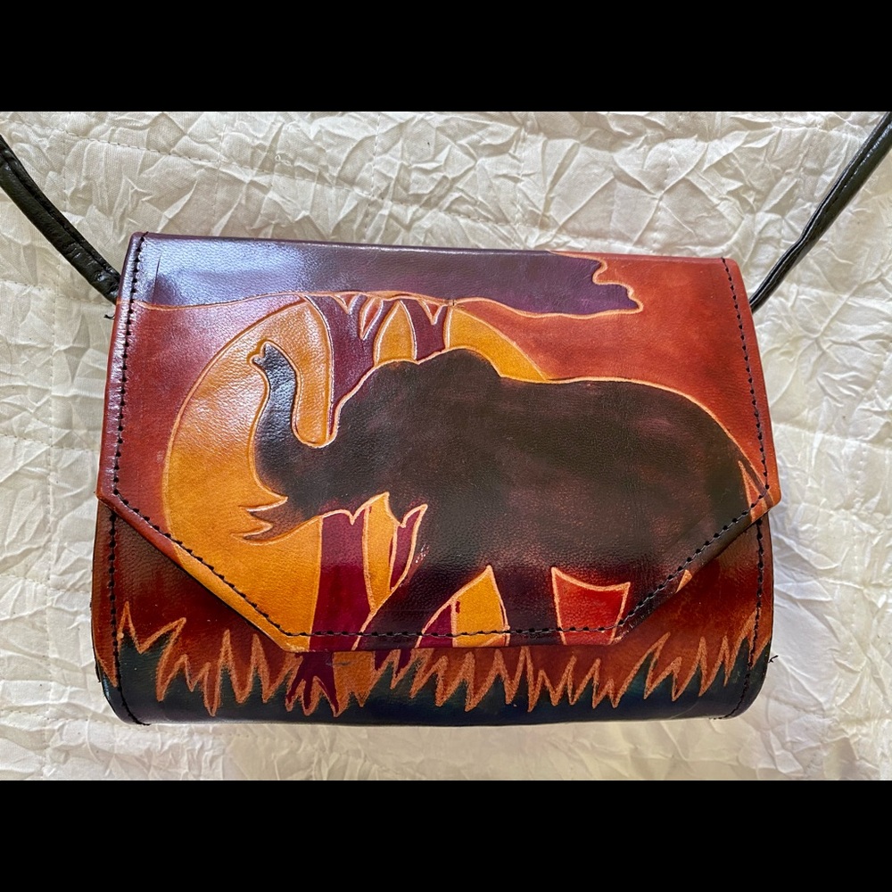 Small leather handbag with elephant design